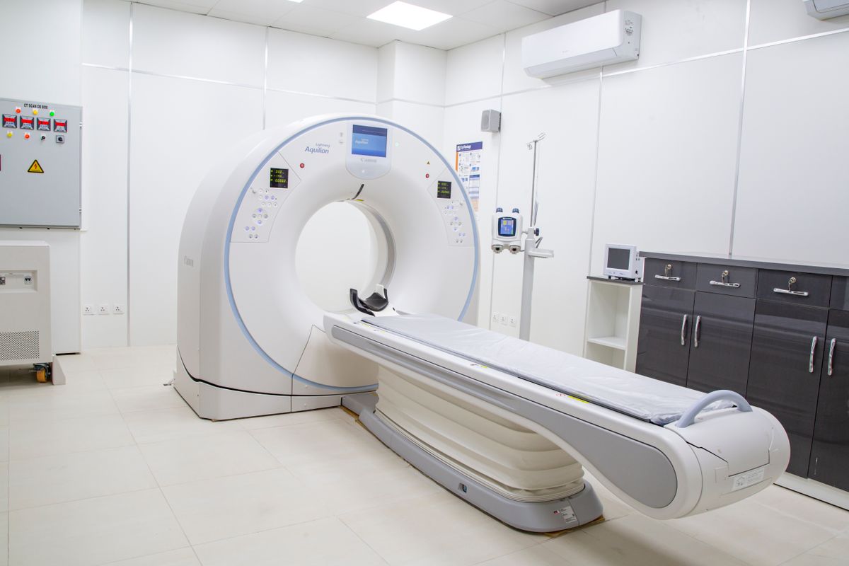 CT scanner gantry and patient table — representative of platforms serviced