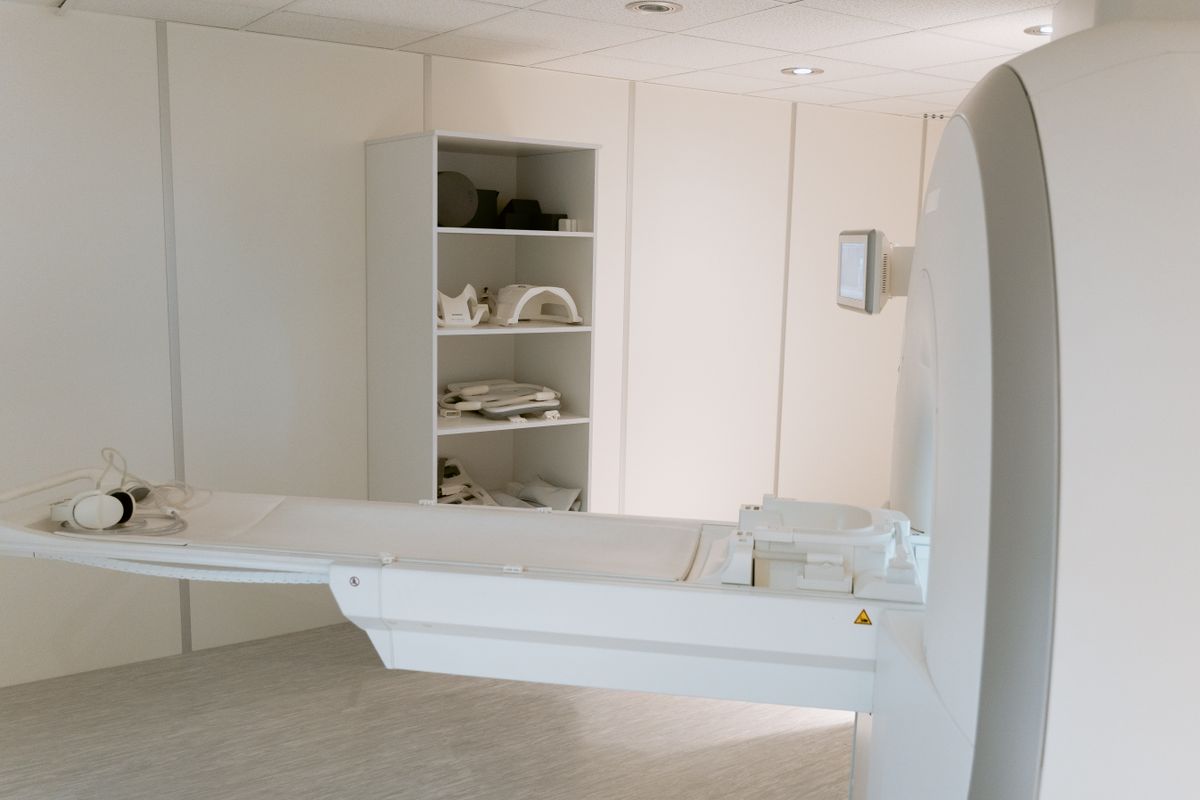 1.5T MRI scanner and patient table — representative of mobile unit equipment